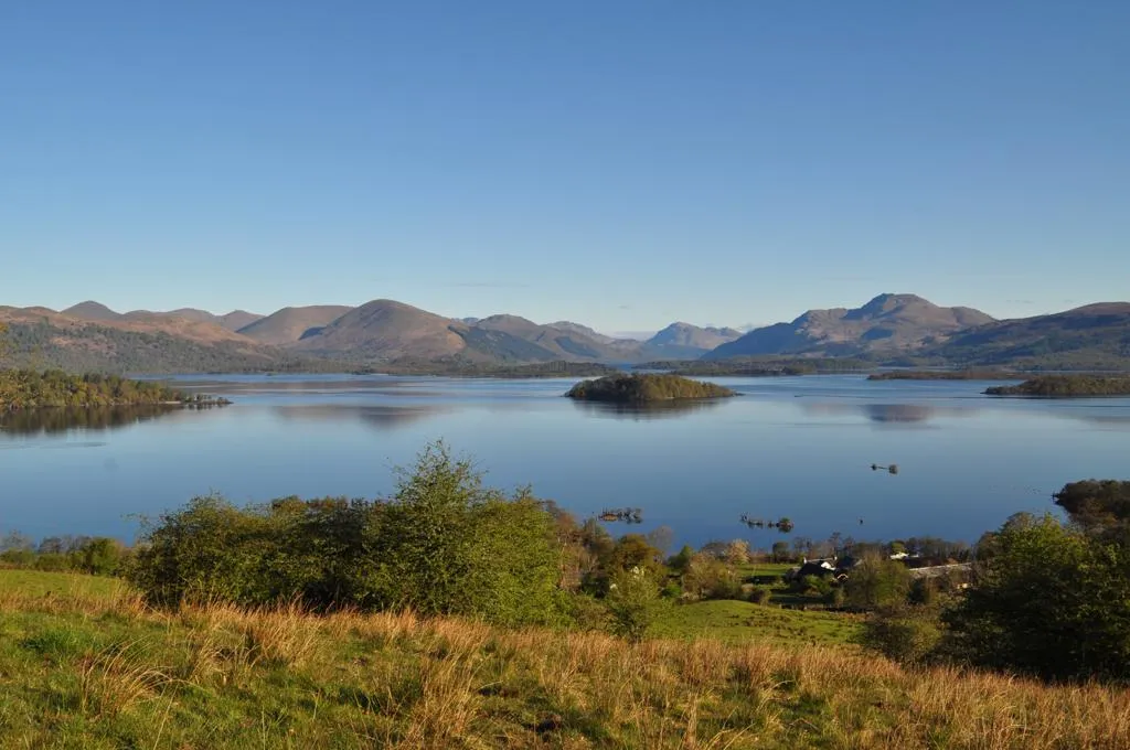 A view over Loch Lomond with islands and hills in the distance